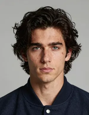 Candidate face 2, selected: the same character with longer, messier black hair
